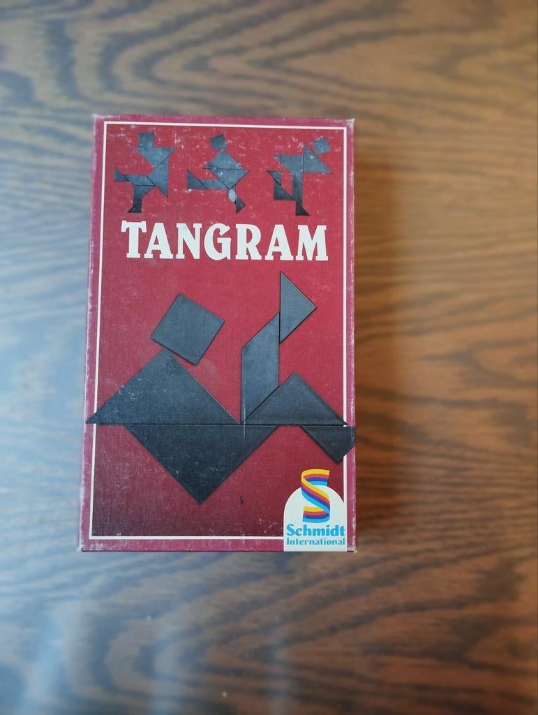 Tangram dans sa boîte d'origine+règles et solutions, 1 ou 2 joueurs, Enlèvement ou Envoi, Comme neuf, Schmidt International