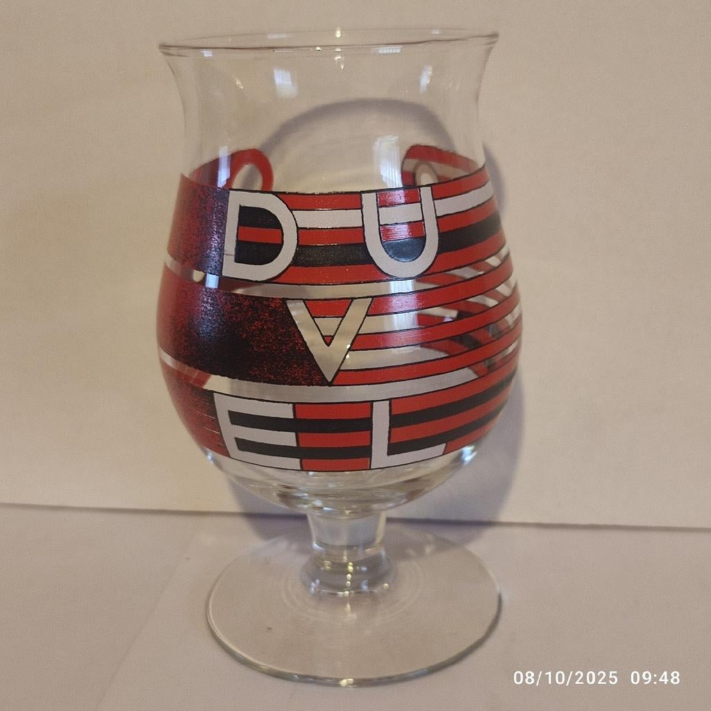Un verre Duvel collector ., Enlèvement ou Envoi, Comme neuf, Verre ou Verres, Duvel