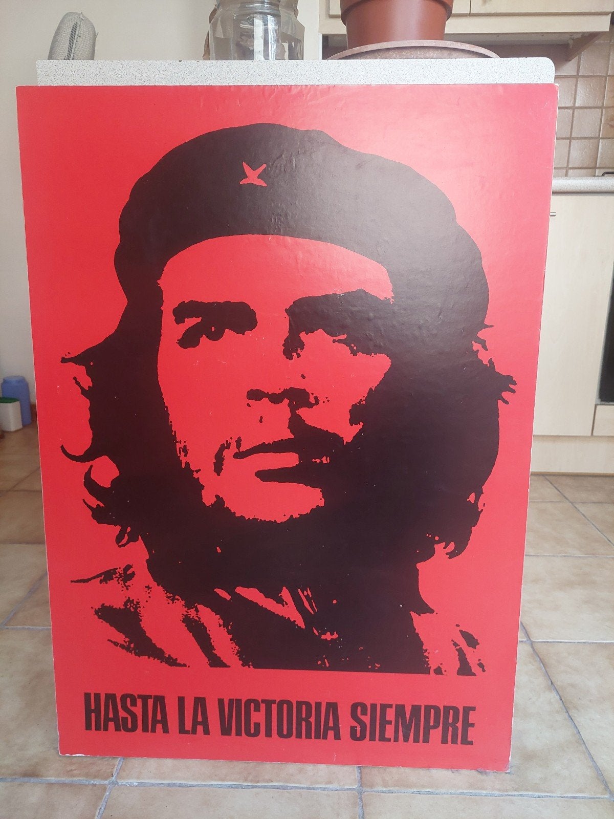 portrait bois Che Guevara, Ophalen