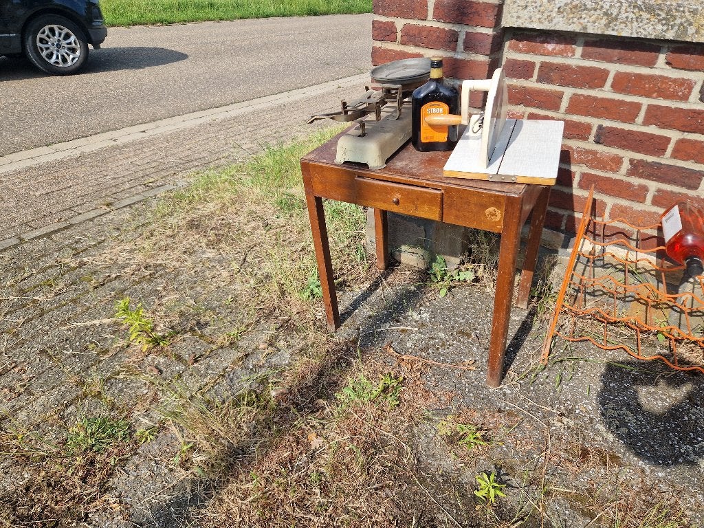 Gratis antieke lessenaar, Ophalen