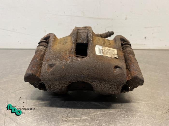 Etrier de frein (pince) avant gauche d'un Peugeot 208 (208 1, -, 3 mois de garantie, Utilisé, -