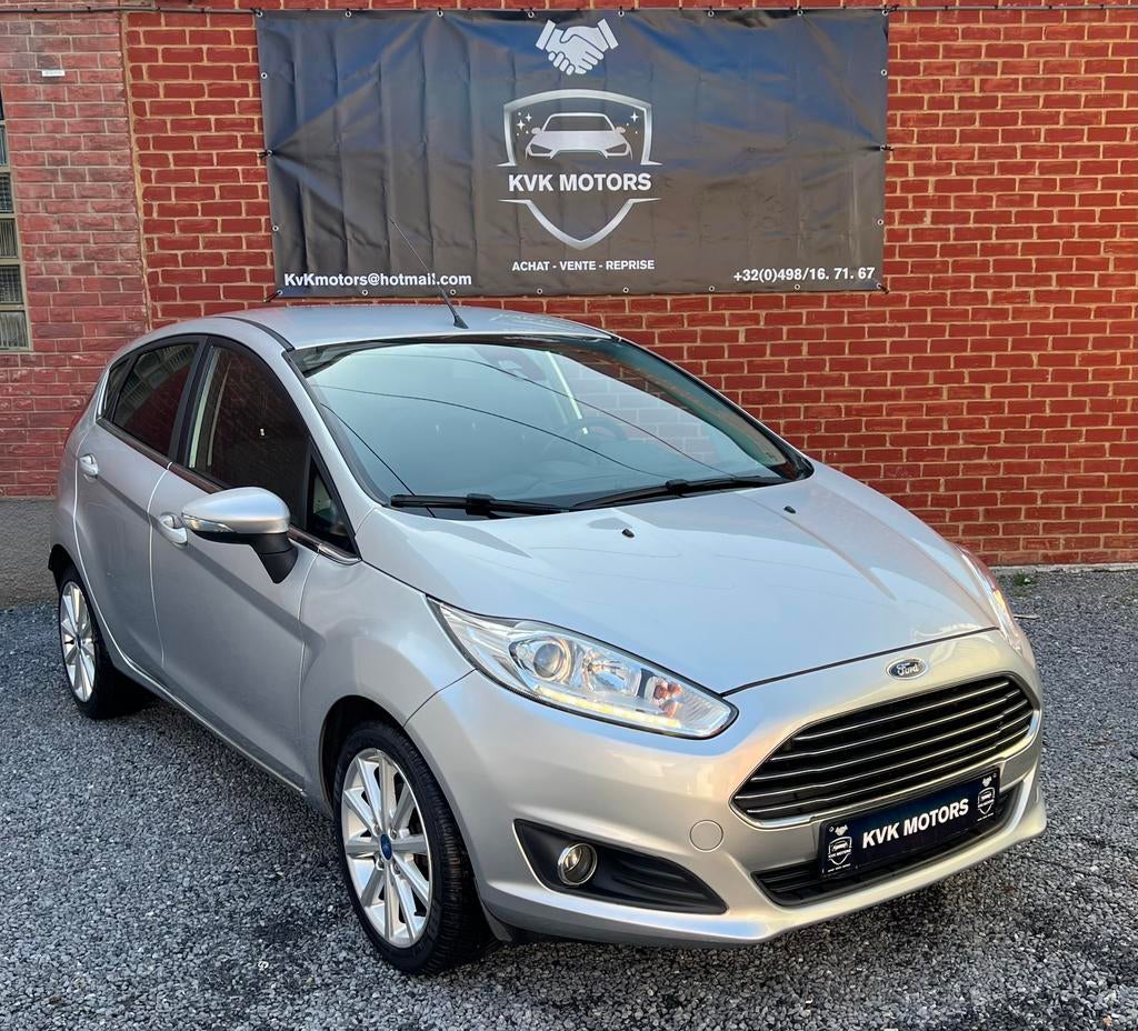 Ford Fiesta 2016 1.0i Titanium **Garantie 12 mois**, Auto's, Ford, Voorwielaandrijving, Testrit aan huis, Stof, https://public.car-pass.be/vhr/c13832ff-bb23-4c20-9cba-b98de709366e