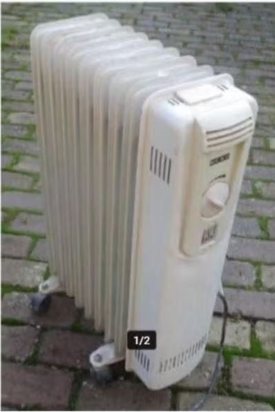 Prima Olieradiator op Wieltjes van Meno, Doe-het-zelf en Bouw, Verwarming en Radiatoren, Ophalen of Verzenden, Zo goed als nieuw