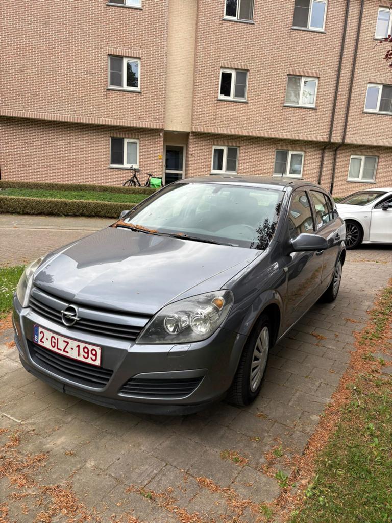 Opel Astra 1.4i XE 16v Comfort, Autos, Argent ou Gris, Noir, 5 portes, Vitres électriques
