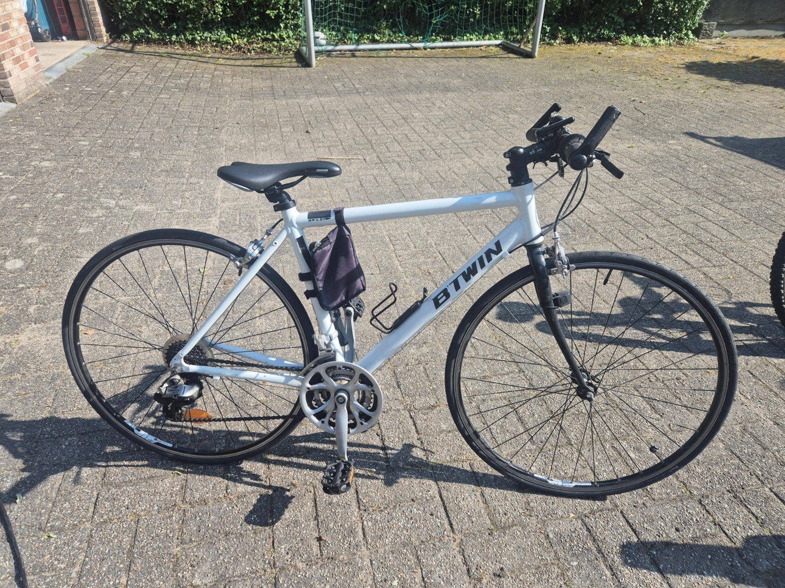 koersfiets Btwin, Ophalen