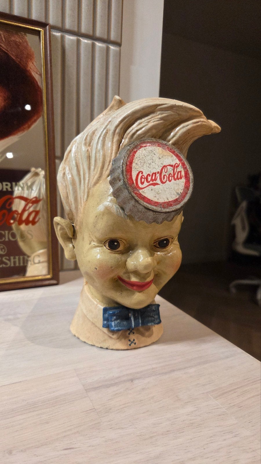 Coca-Cola Sprite boy spaarpot, Ophalen