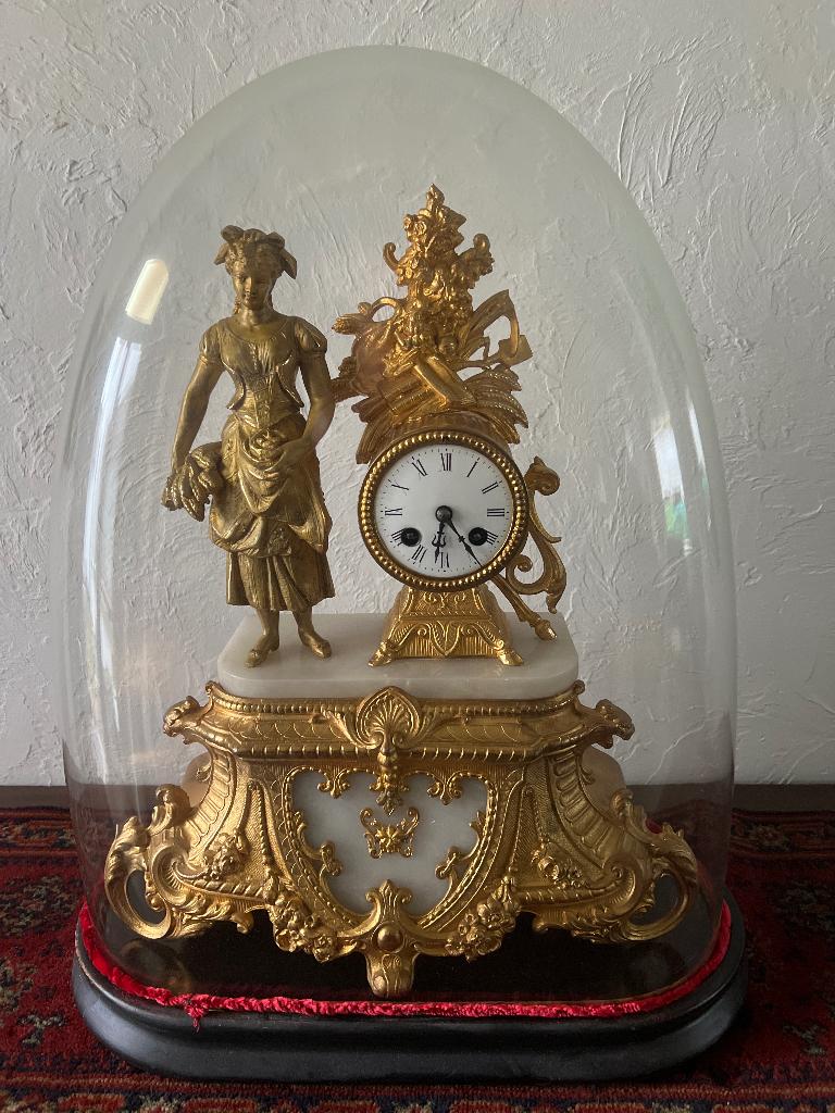 Franse pendule met figuur, Ophalen