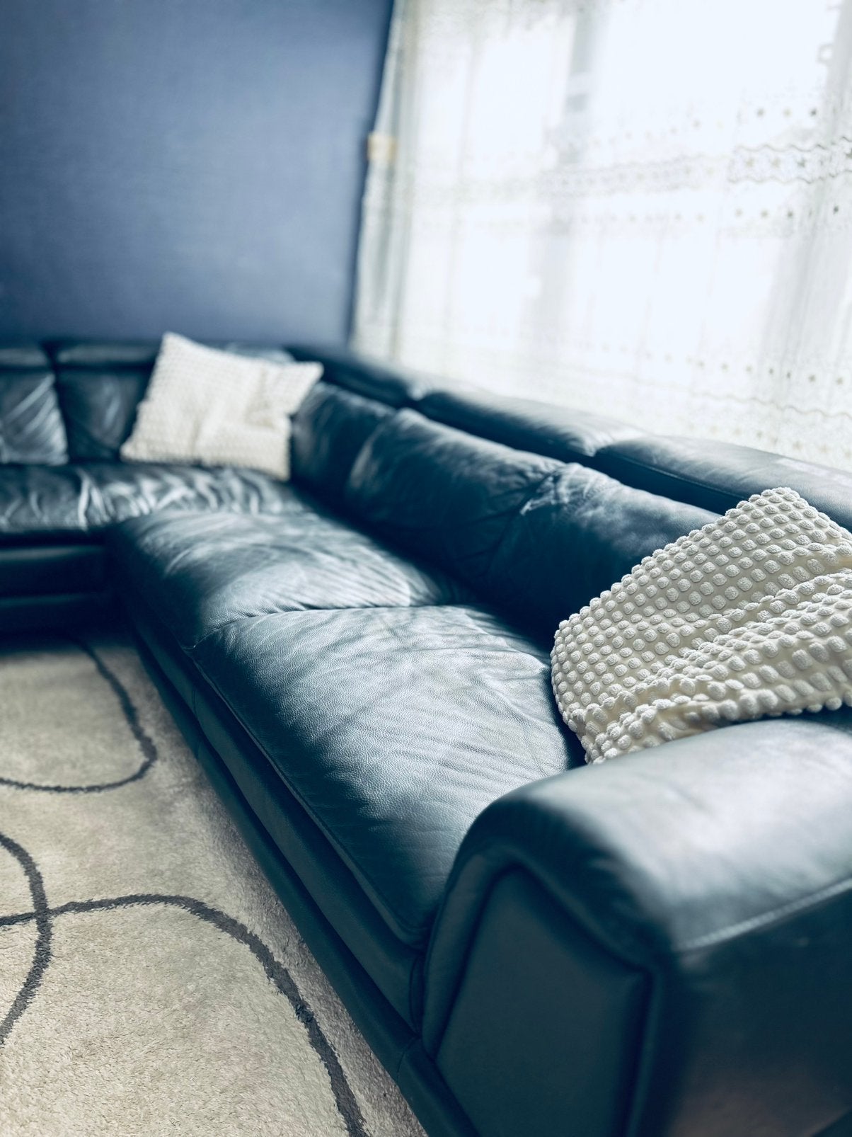 Belle banquette d'angle en cuir noir en très bon état, Enlèvement, Utilisé