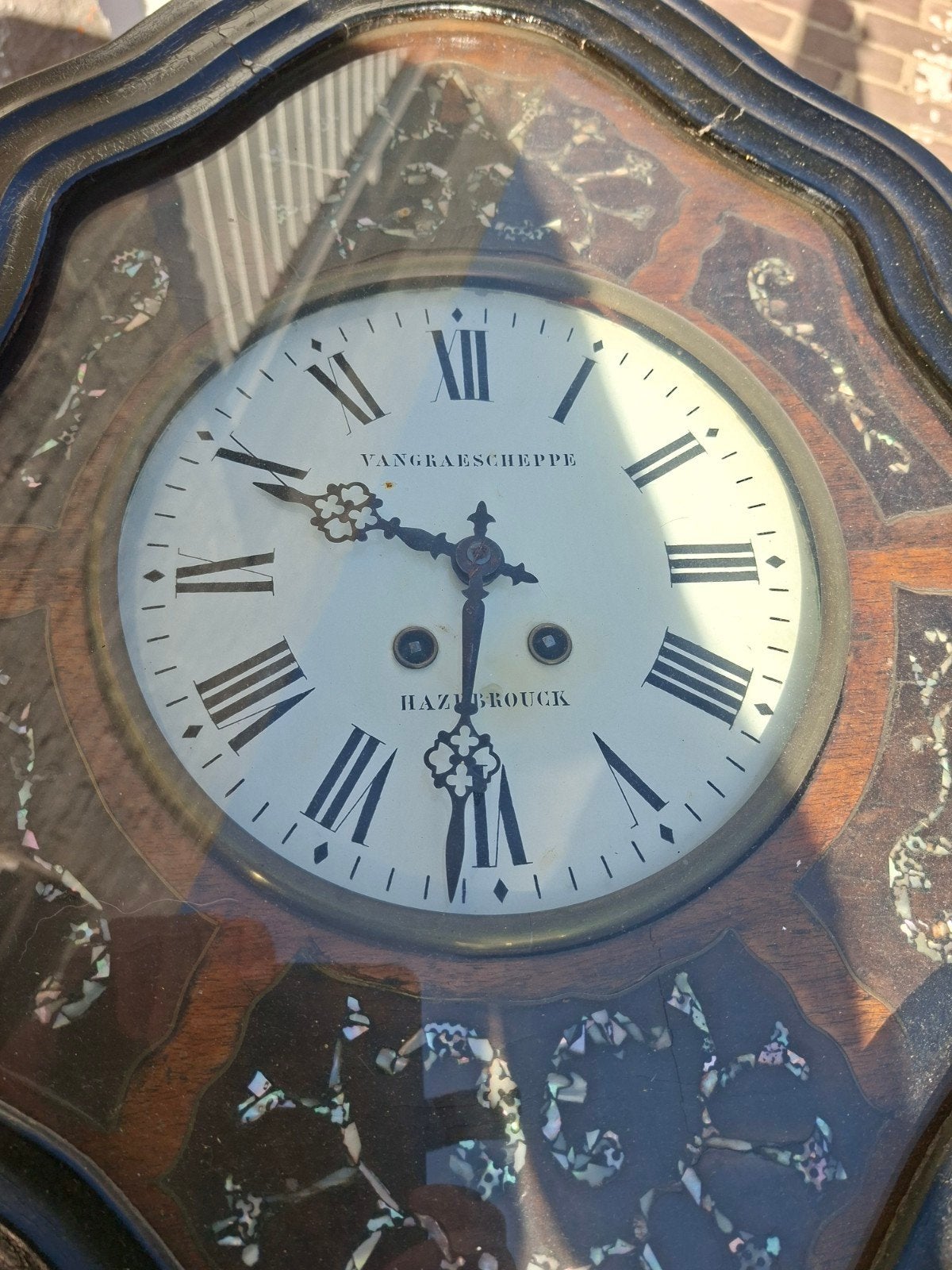 Oeil de boeuf osseoog te koop klok, Ophalen