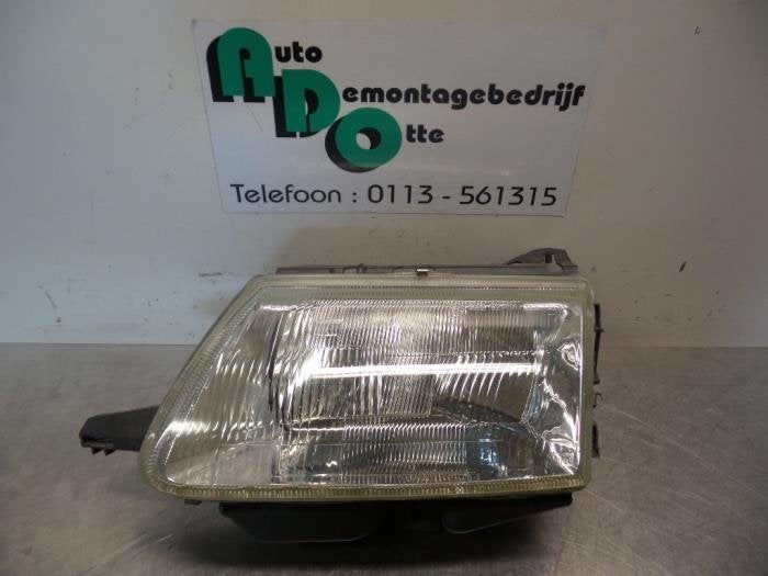 Phare gauche d'un Citroen Saxo (Saxo 96-), -, 3 mois de garantie, Utilisé, -