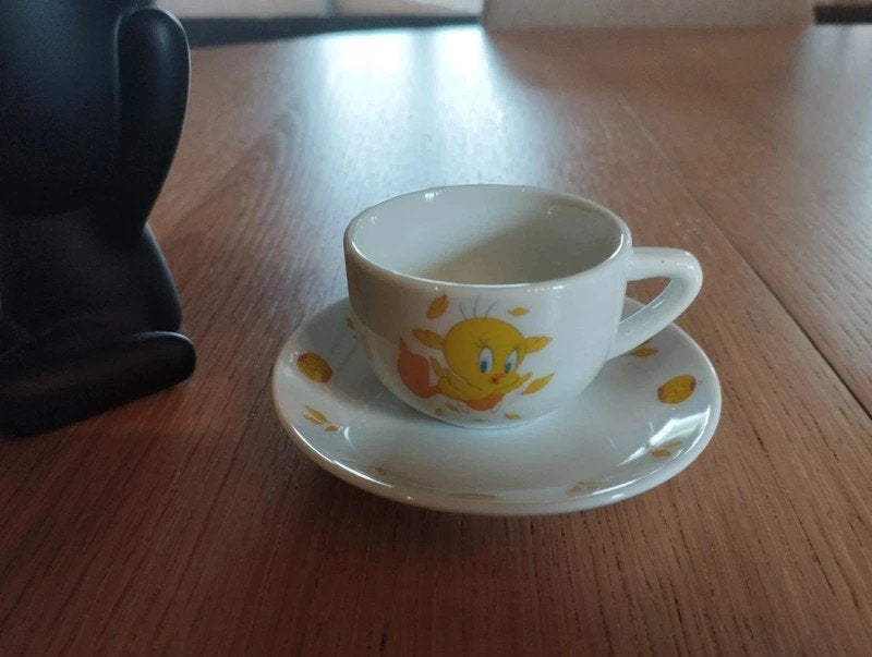 Tasse + sous tasse Titi en porcelaine . Neuves, Enlèvement, Porcelaine