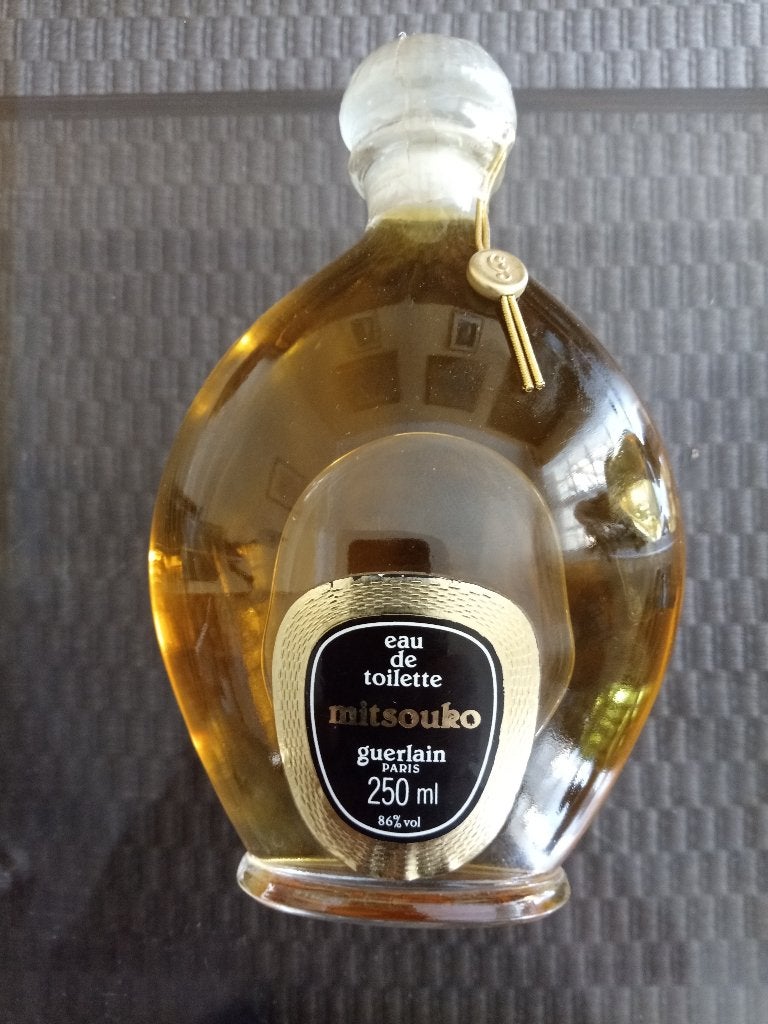 Flacon GUERLAIN 250 ml, Ophalen of Verzenden, Zo goed als nieuw, Parfumfles, Gevuld