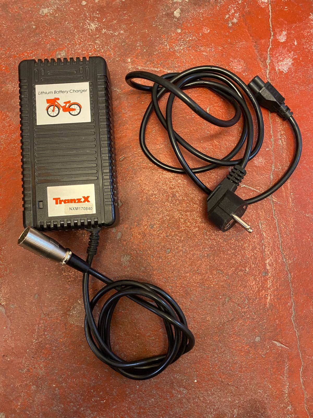 TranzX originele en snelle fiets acculader, Vélos & Vélomoteurs, Vélos électriques, Enlèvement, Comme neuf