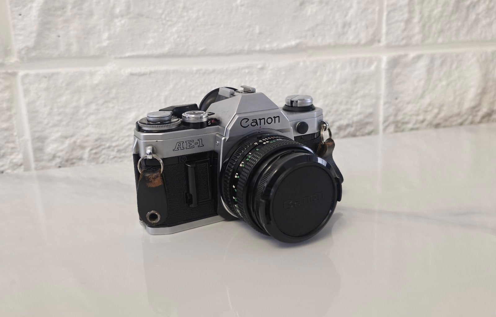 Canon AE-1 Professionele Toestel, Ophalen, Canon