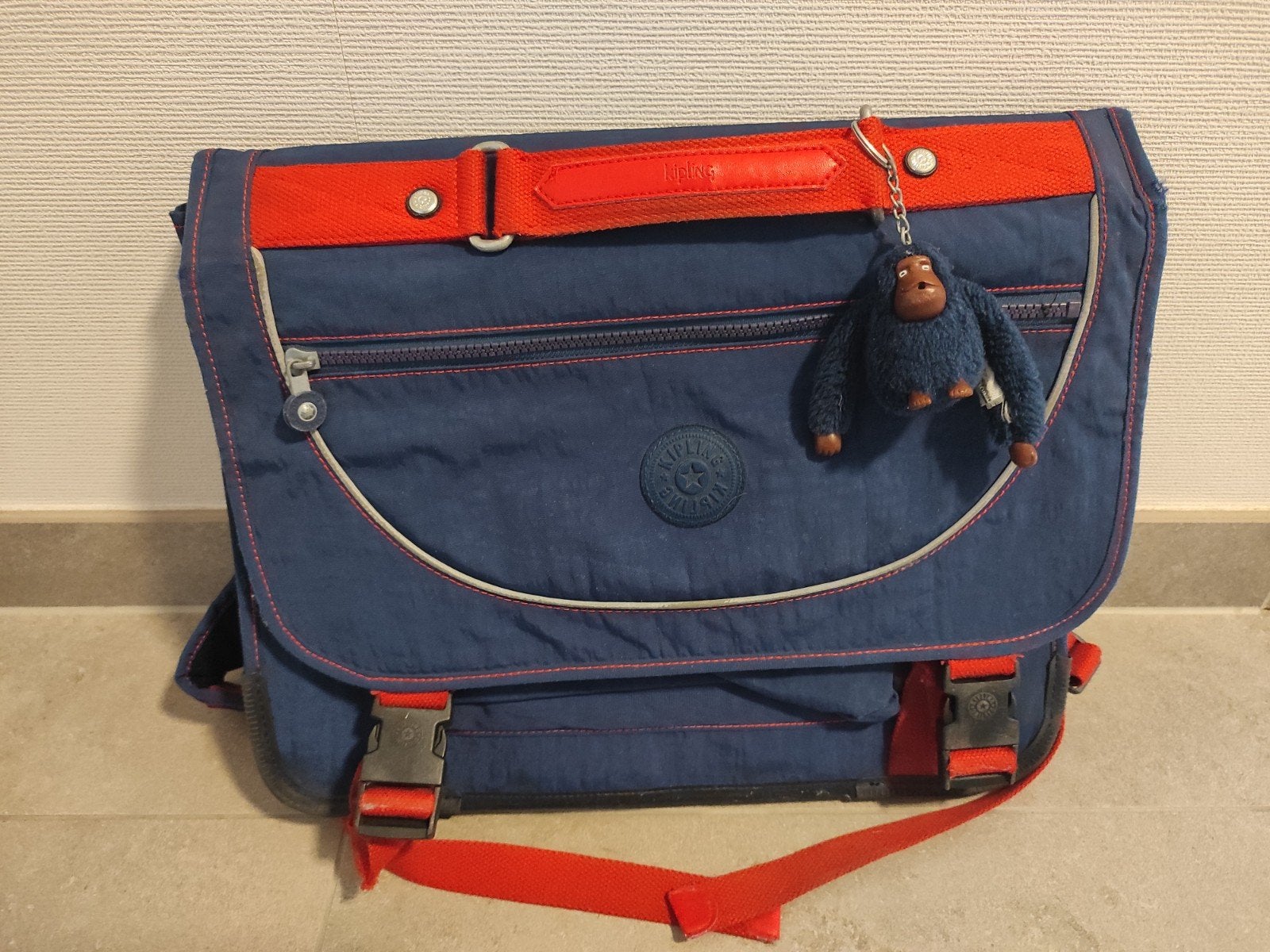 kipling boekentas, Ophalen