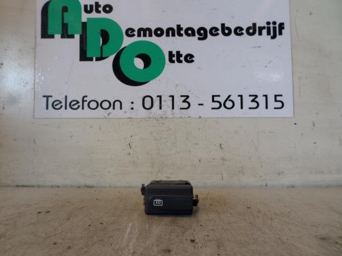 Commutateur chauffage vitre arrière d'un Renault Clio (Clio, Renault, -, 3 mois de garantie, Utilisé