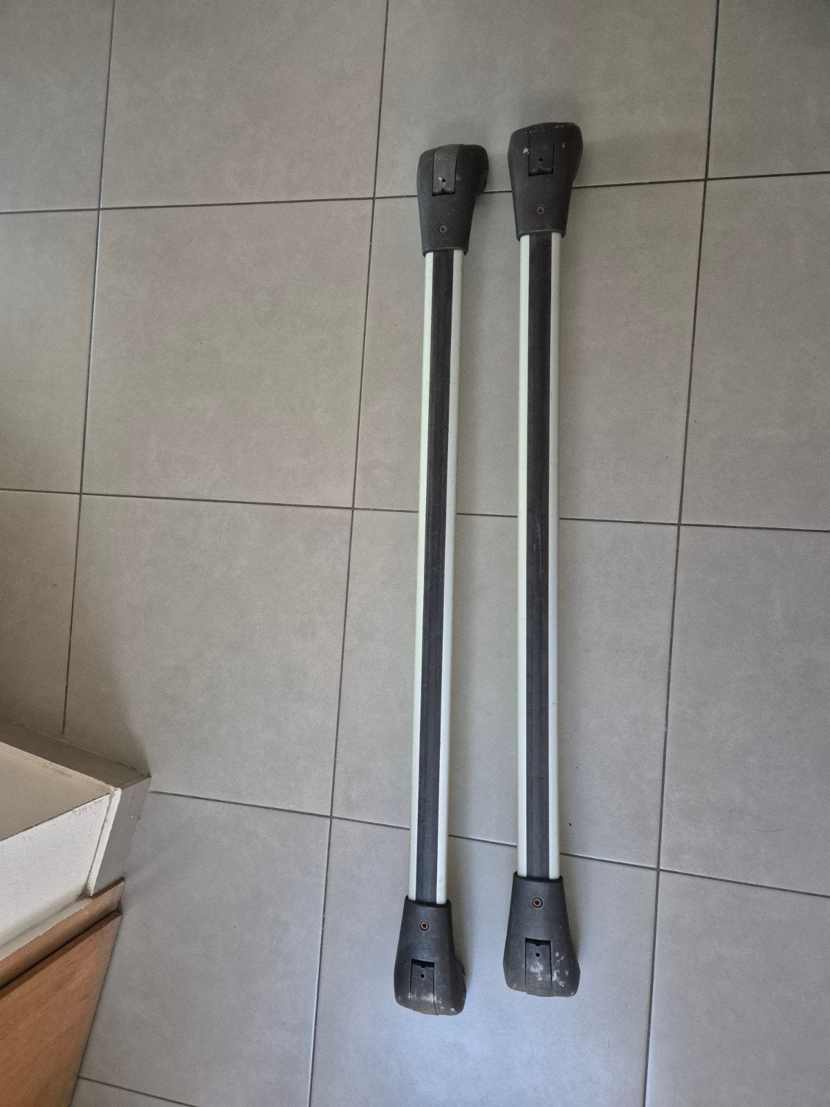 Barre de porte bagage