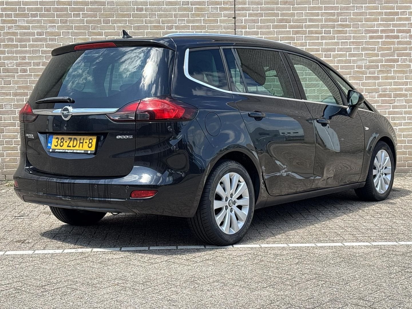 Opel Zafira Tourer 1.4 Cosmo 7p. | Climate | Cruise | Navi |, Auto's, 144 g/km, Monovolume, Zwart, Zwart