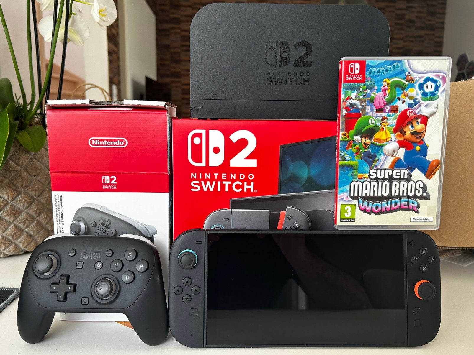 Console Switch 2 + manette Pro + jeu Super Mario Wonder, Enlèvement ou Envoi, Utilisé, Avec jeux