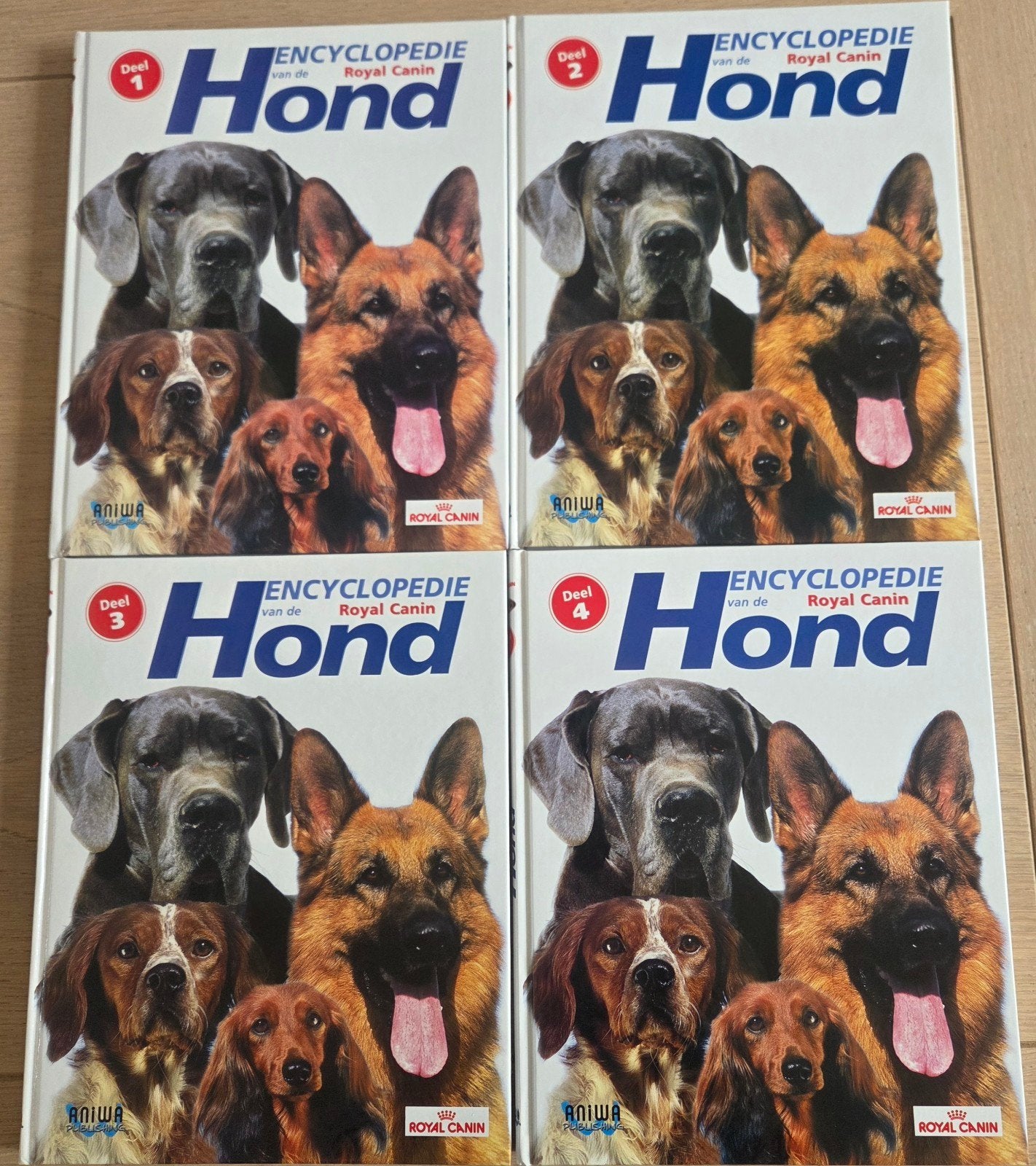 4 delig encyclopedie van de hond van Royal Canin, Royal Canin, Ophalen of Verzenden, Zo goed als nieuw, Dieren