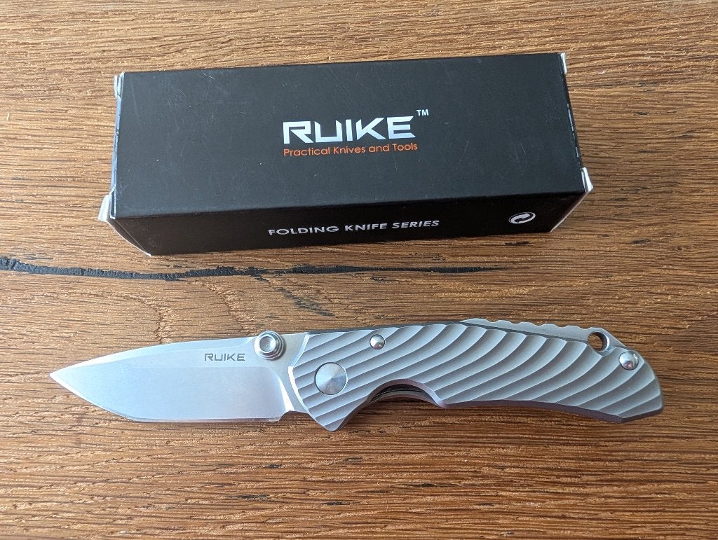Couteau de poche en titane Ruike M671-TZ (neuf), Enlèvement ou Envoi, Comme neuf