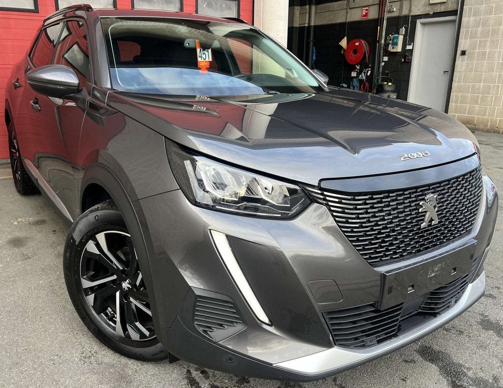 Peugeot 2008 1.2 PureTech Allure S + CAMÉRA + NAVI + CUIR, Auto's, Gebruikt, 1199 cc, Leder, Bedrijf