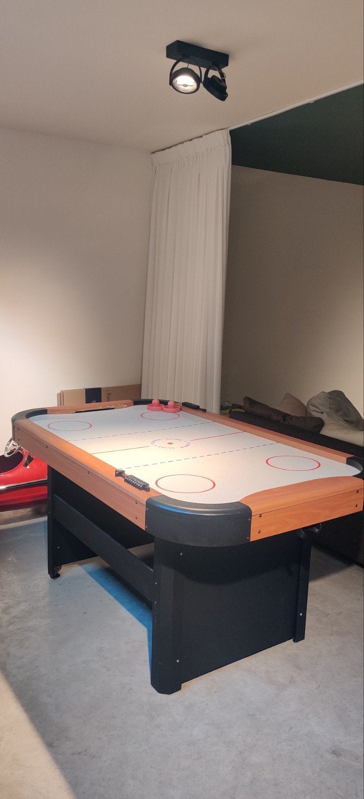 Airhockey tafel, Ophalen