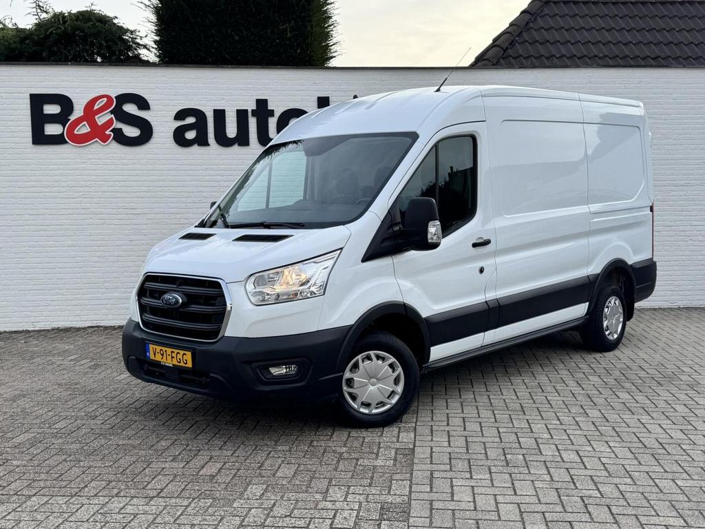 Ford TRANSIT 130pk L2H2 Trend Airco Cruise Pdc 3 Zitplaatsen, Wit, Bedrijf, Ford, Onderhoudsboekje