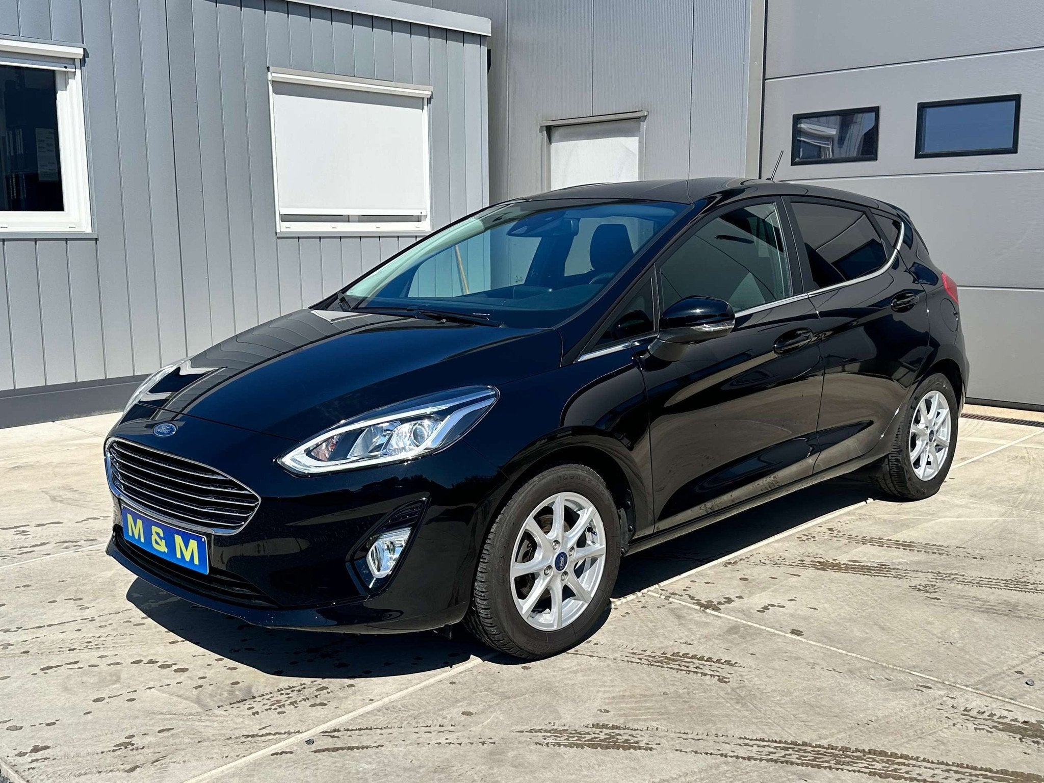Ford Fiesta Fiesta 1.0 EcoBoost Titanium *12M garantie*, Auto's, Ford, Stof, Gebruikt, Zwart, Bedrijf