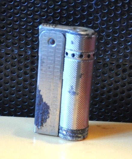 briquet vintage a essence amco tripiex junior 6600, Ophalen of Verzenden, Gebruikt, Aansteker