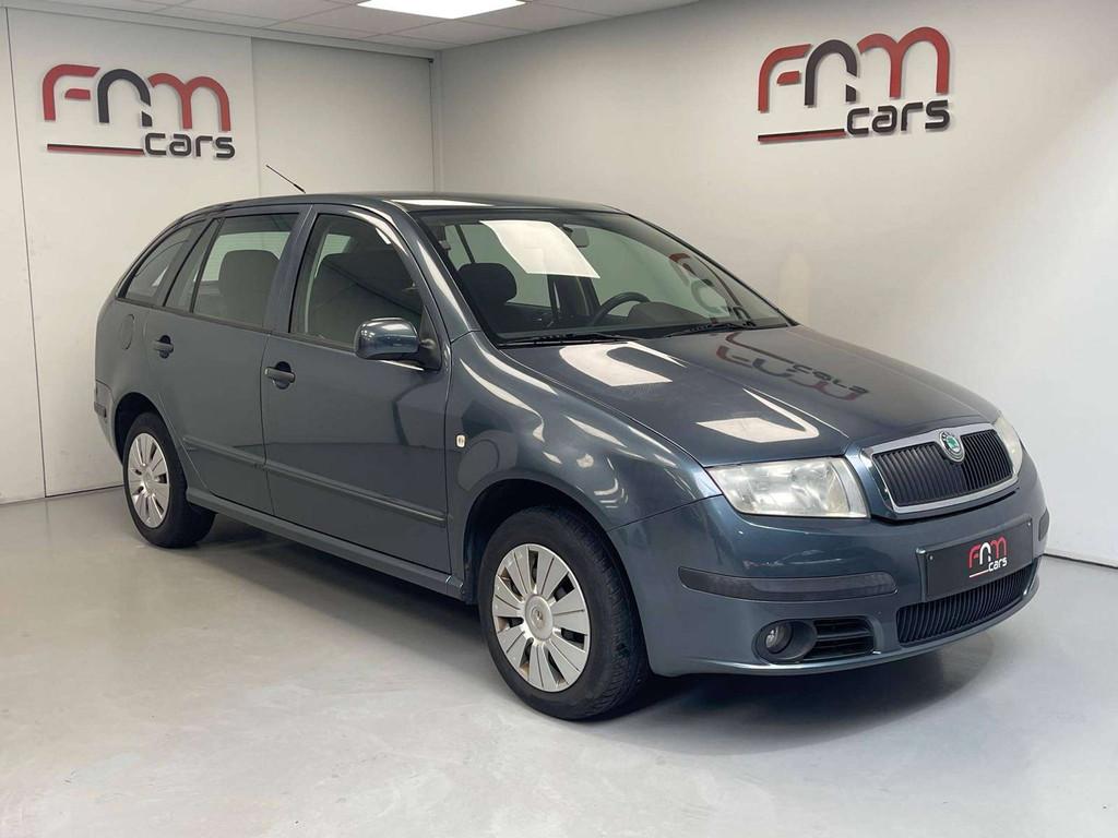Skoda Fabia 1.2i benzine Trekhaak Airco Gekeurd voor verkoop, Auto's, 144 g/km, Stof, Gebruikt, Zwart