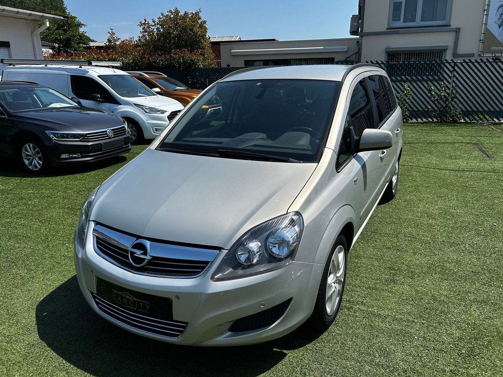 Opel Zafira 1.6i Cosmo°7 PLAATSEN° A/C ° 12M GARANTIE, Auto's, Voorwielaandrijving, Euro 5, Stof, Gebruikt
