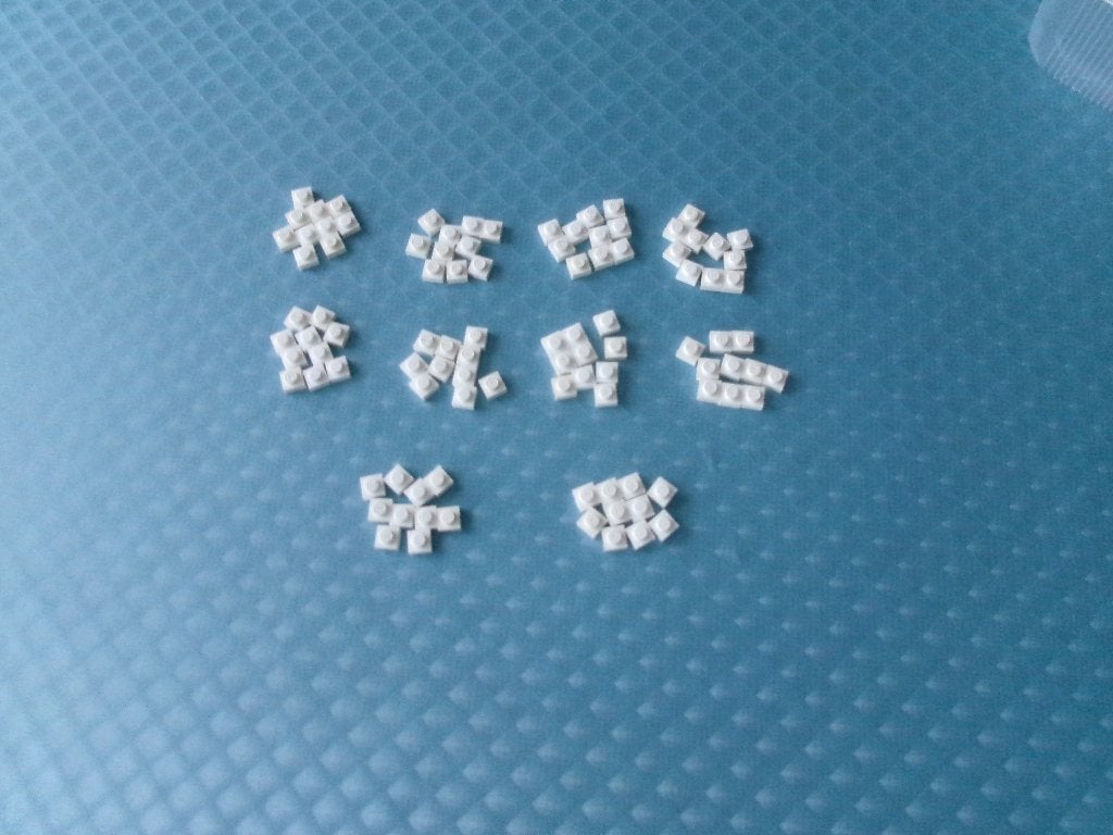 D15 100 witte Lego 1x1 platen, Gebruikt, Lego, Ophalen of Verzenden, Losse stenen