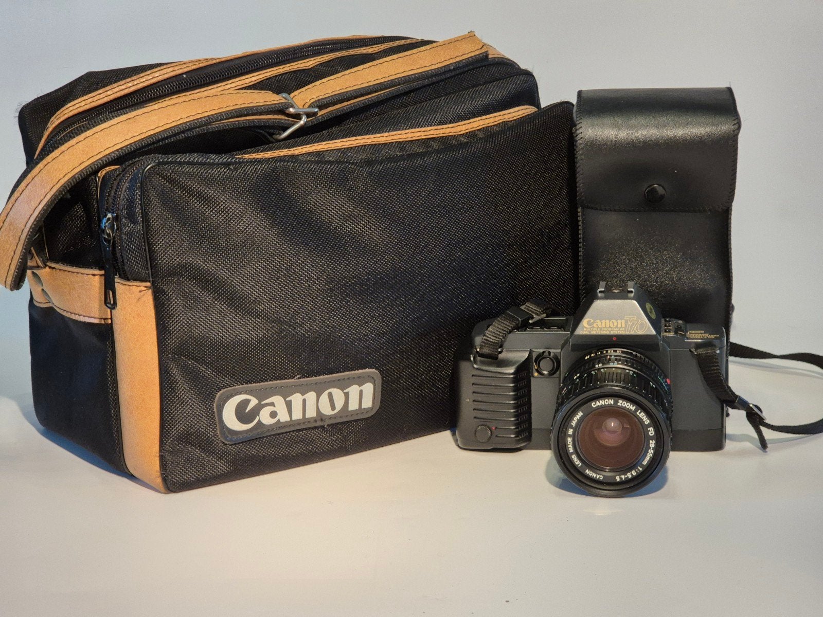 Canon T70 + FD 28–55mm + Speedlite 299T – état neuf, Enlèvement ou Envoi, Canon
