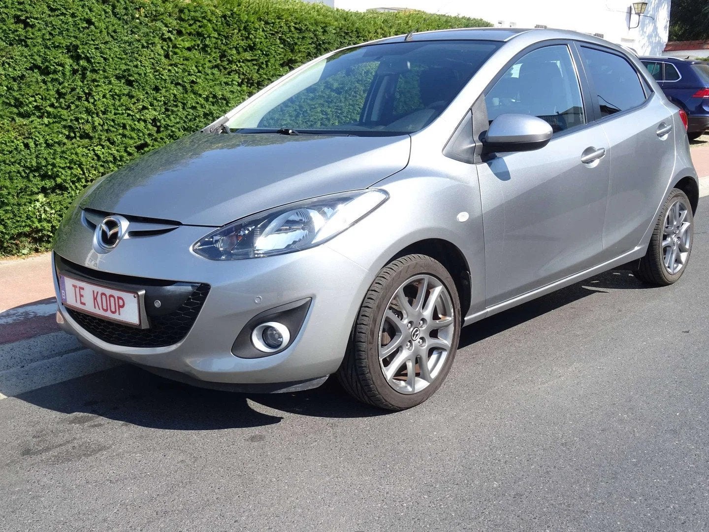 Mazda 2 2 1.3i Sport Navigator, Autos, Entreprise, Boîte manuelle, Noir, Capteur de stationnement