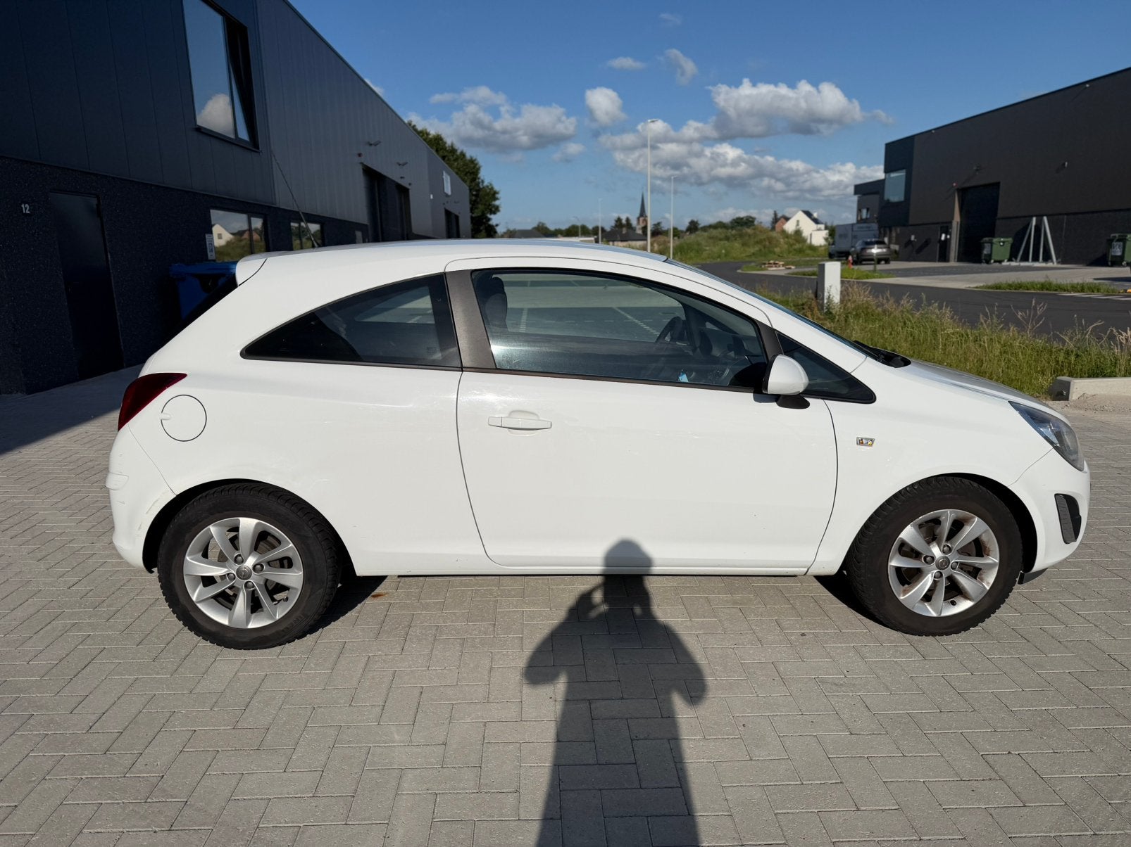 Opel Corsa 1.2 benzine 2013 142.700km, Auto's, Opel, Euro 5, Stof, Zwart, Lichtsensor