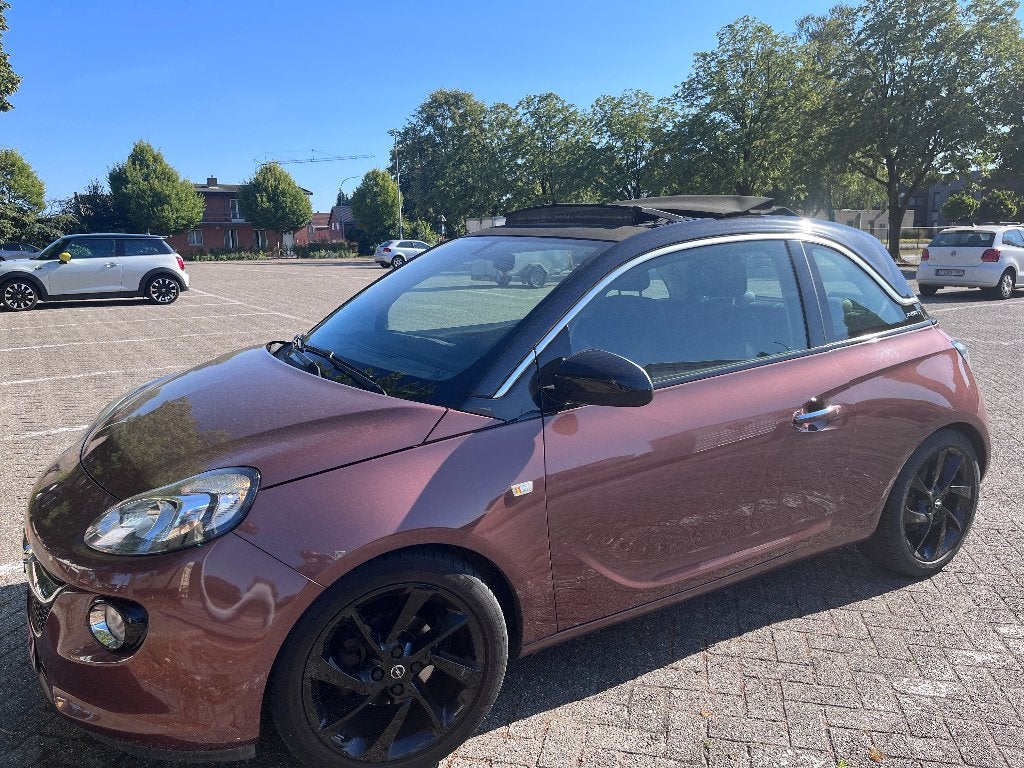 Opel Adam unlimited 1.0 Turbo Ecotec cabrio met Chroom pack, Auto's, ADAM, Leder en Stof, Handgeschakeld, Particulier