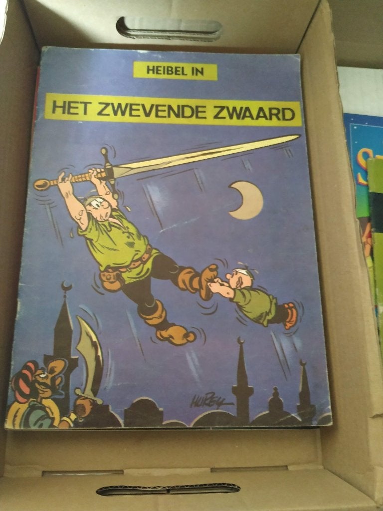 strip Heibel in het zwevende zwaard, Ophalen of Verzenden