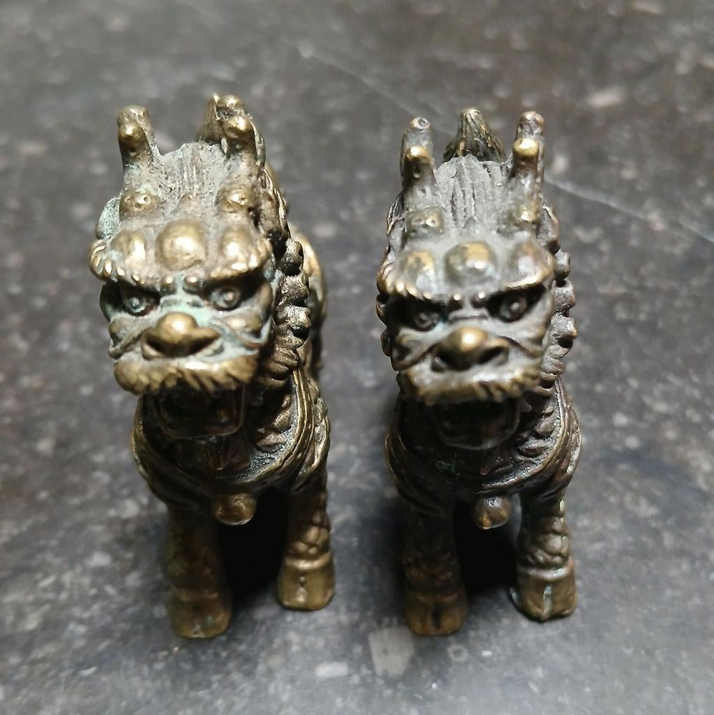 Paar oude bronzen ovens, Ophalen