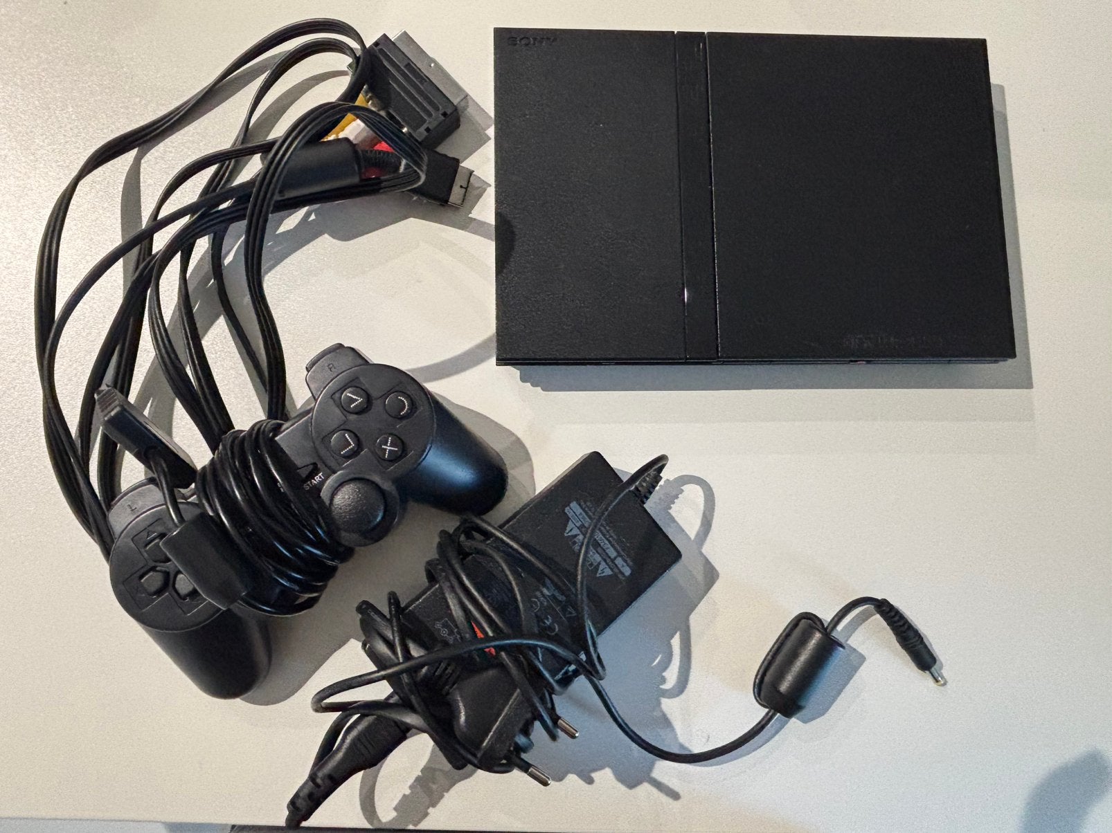 Ps2 Slim met controller, Games en Spelcomputers, Gebruikt, Zwart, Ophalen of Verzenden, Met 1 controller