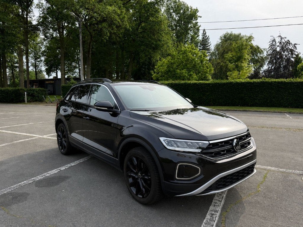 Volkswagen T-Roc 1.5 TSI DSG 150pk | 2024, Auto's, Stof, 1498 cc, Zwart, 5 zetels