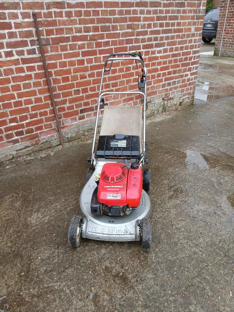 Sterke honda grasmaaier, Ophalen