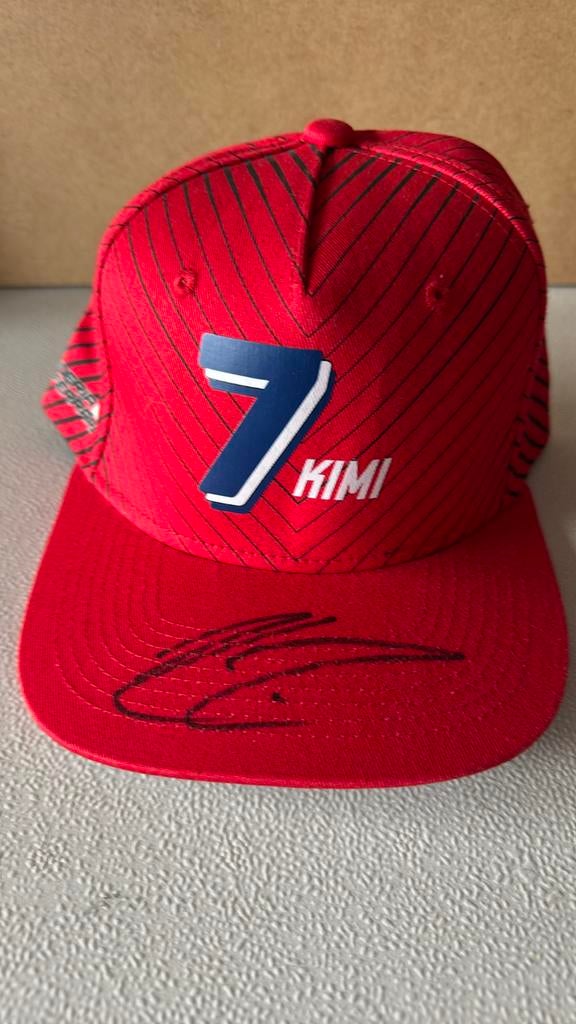 Kimi Raikkonen gesigneerde pet, Enlèvement ou Envoi, Casquette