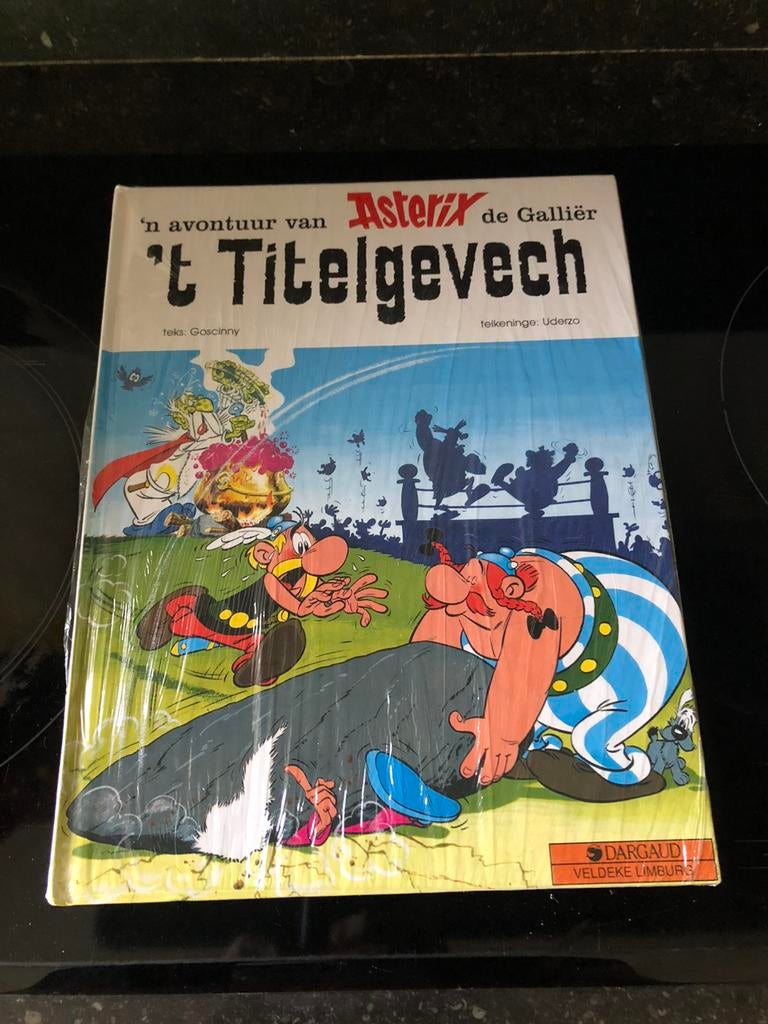 Bande dessinée ASTÉRIX 't Titelgevech, Enlèvement ou Envoi, Une BD, Comme neuf, Goscinny / Uderzo