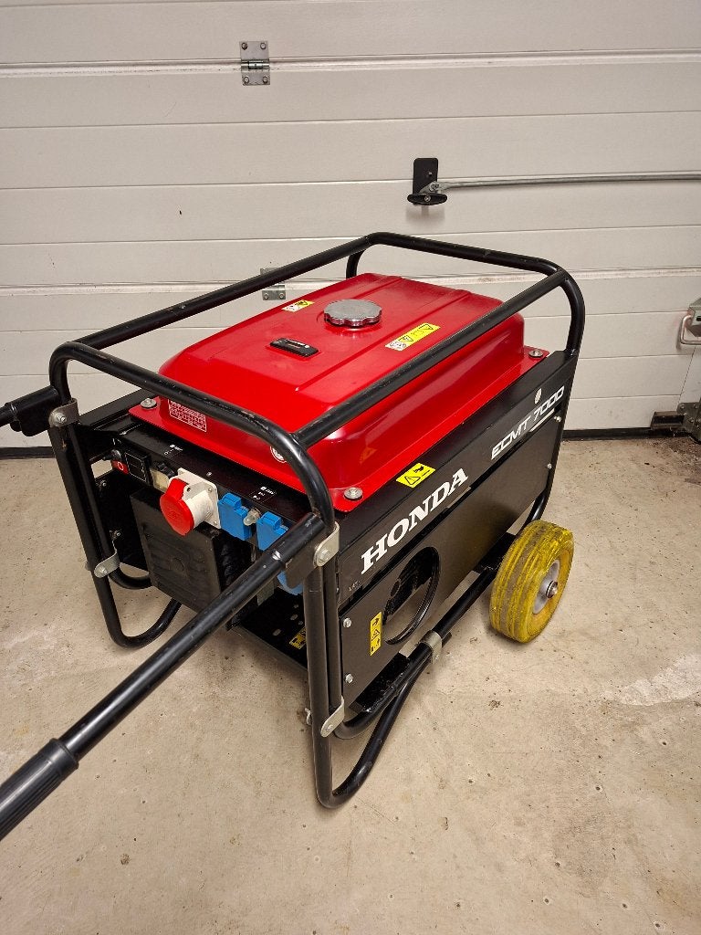 /générateur Honda EMCT7000 en parfait état 230/400 volts, Bricolage & Construction, Enlèvement, Comme neuf, 5 à 10 kVA, Essence