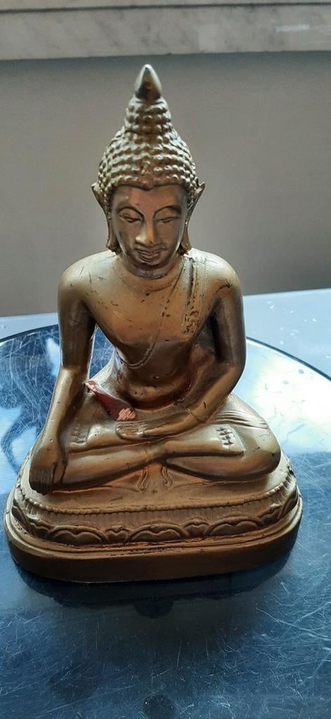 Bouddha en bronze, Enlèvement ou Envoi