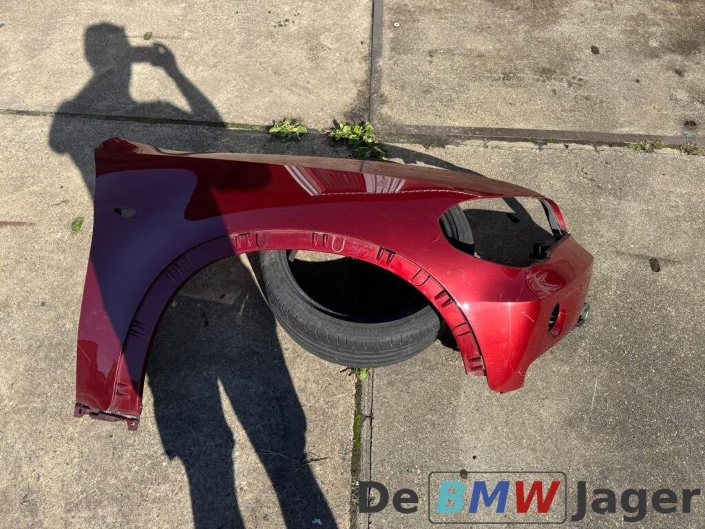 rechter spatbord vermilion rot A82 BMW X5 E70 51127157980, Gebruikt, Ophalen of Verzenden, BMW, BMW