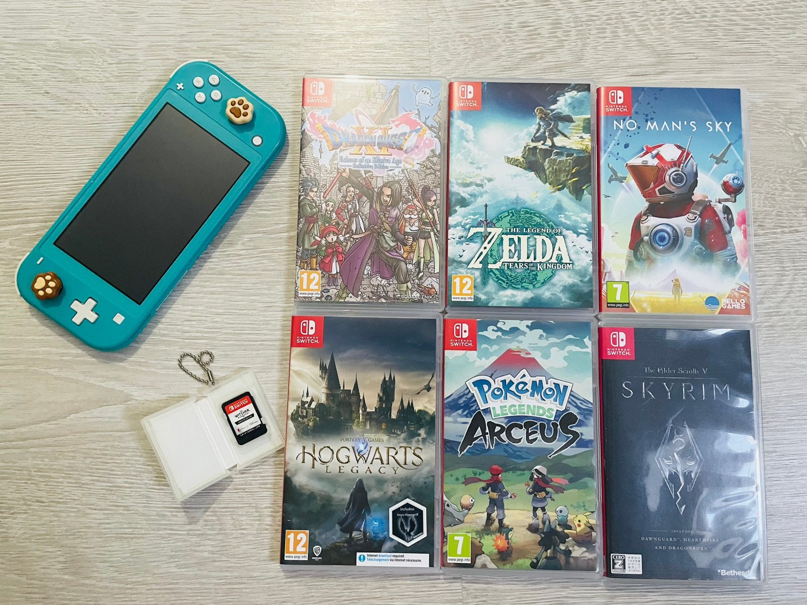 Nintendo Switch Lite met 7 spellen, Games en Spelcomputers, Spelcomputers | Nintendo Switch Lite, Ophalen, Turquoise, Gebruikt