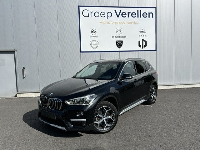 BMW iX1 1.5i sDrive18, 4 cilinders, Zwart, Bedrijf, 5 deurs