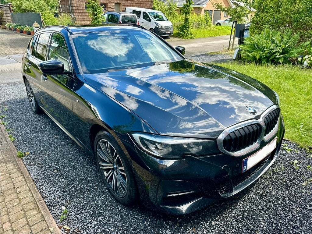 BMW 320 Xdrive / M pack ext / M pack int / trekhaak, Automaat, 1995 cc, Alcantara, Zwart